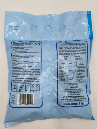 Tył opakowania 2kg Siarczanu Amonu prezentuje tabelę dawkowania dla roślin kwasolubnych i pomidorów.